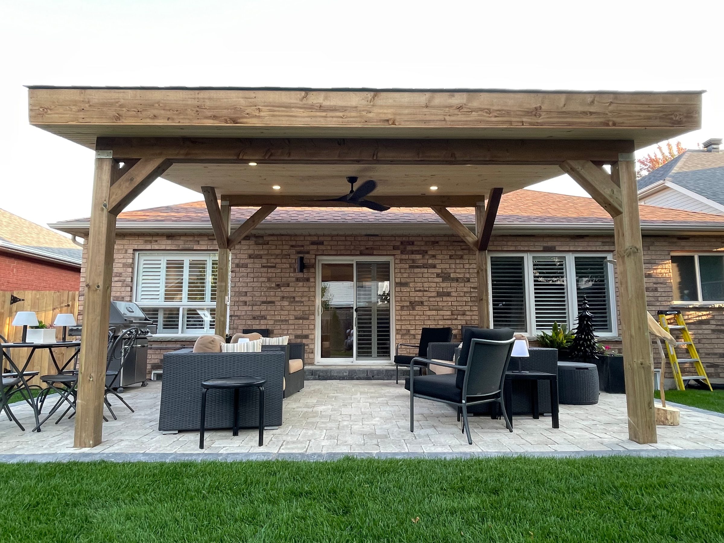 Cedar pergola over a paver patio built by Ace Contracting in Barrie