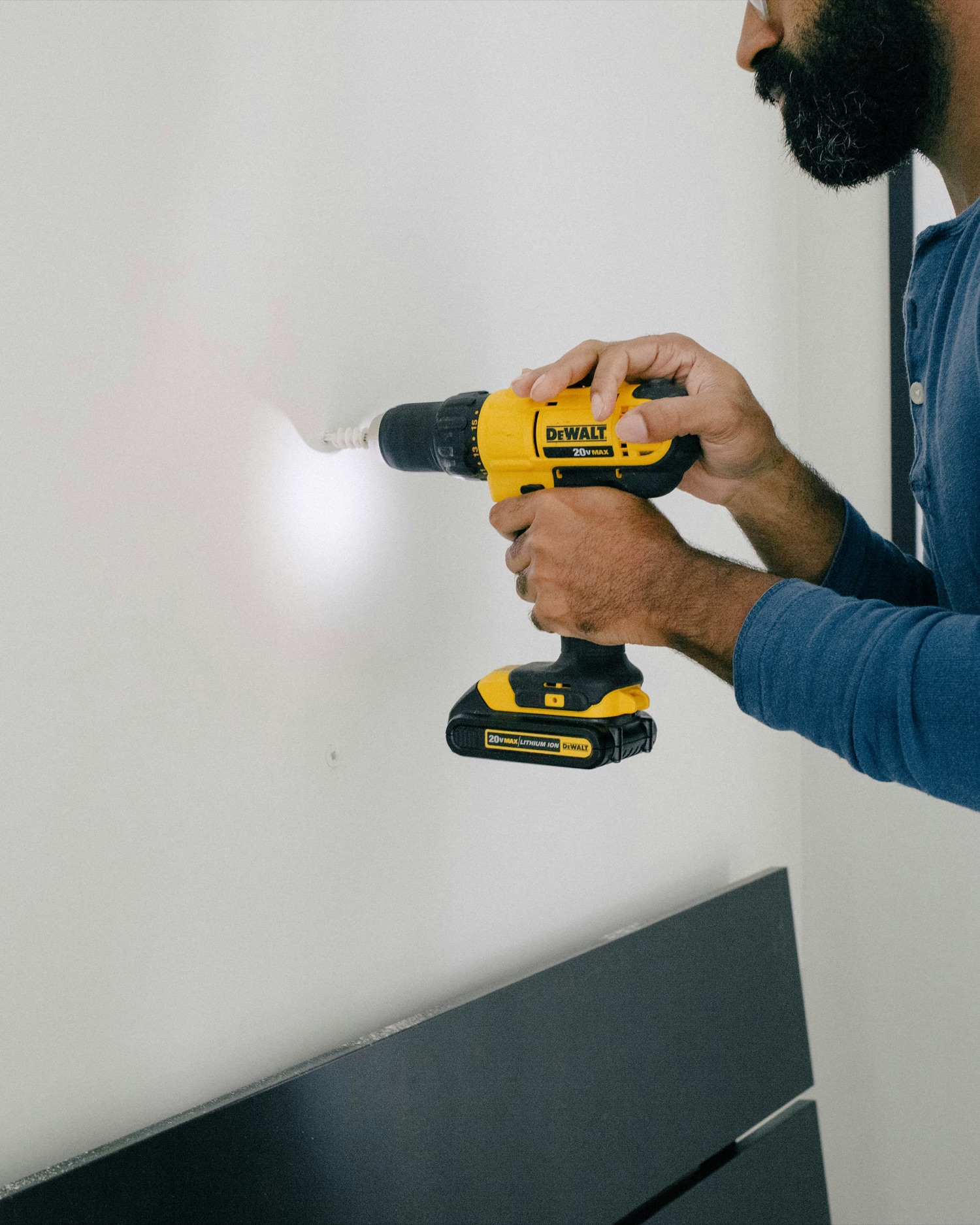 Contractor carefully installing a fixture